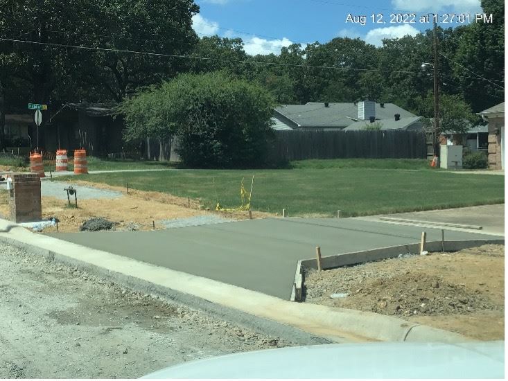 Image of Wet Concrete Driveway Apron